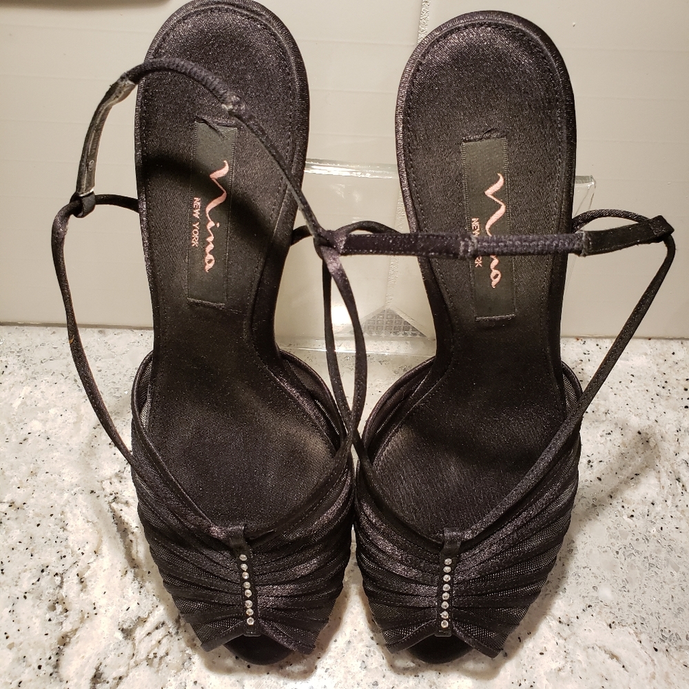 Nina black satin and mesh shoes.